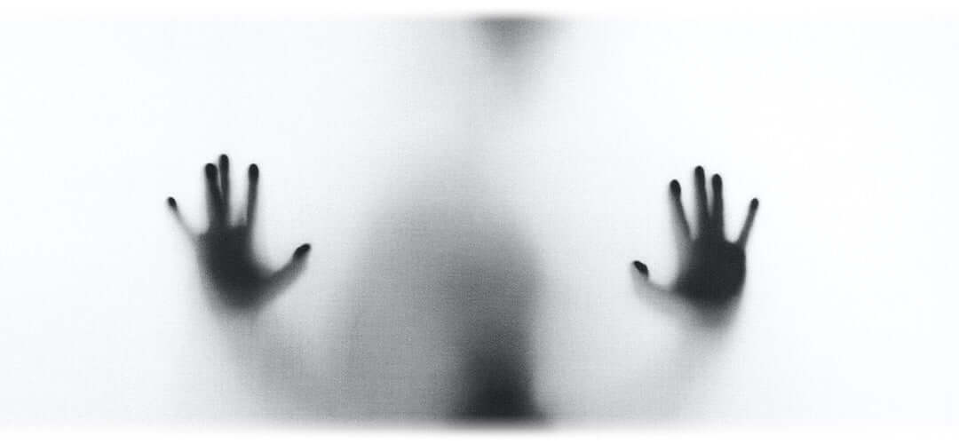 Shadow of a person surrounded in fog. The image depicts the concept of brain fog and strategies to overcome it.
