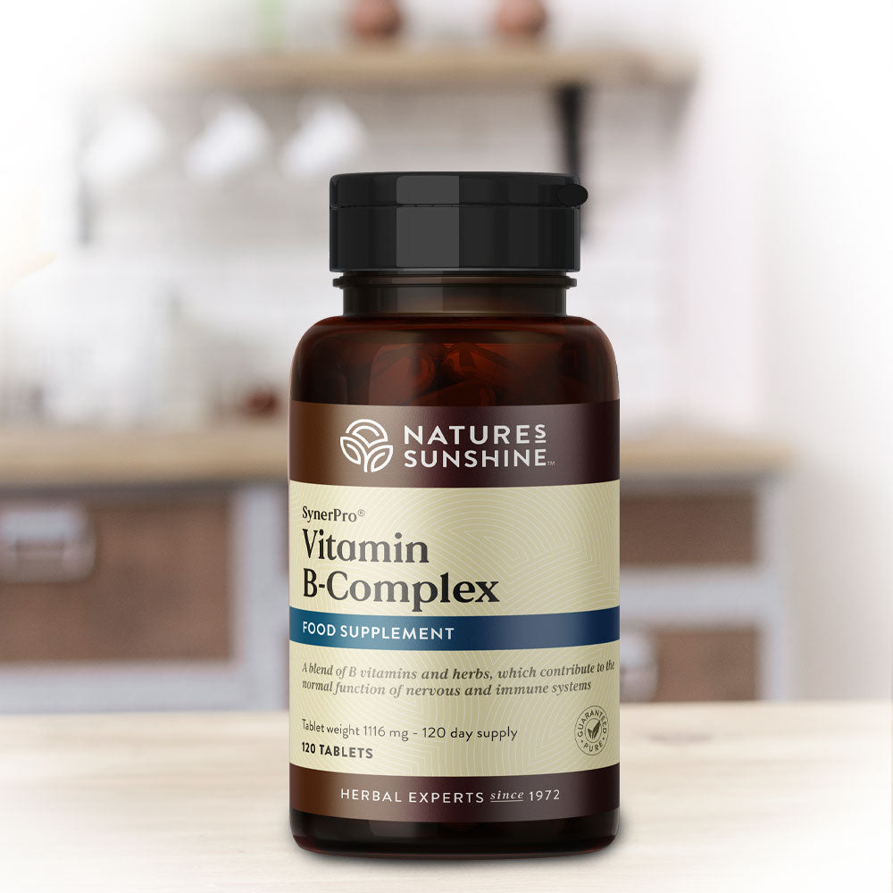 Bottle of Nature's Sunshine Vitamin B Complex on a kitchen counter