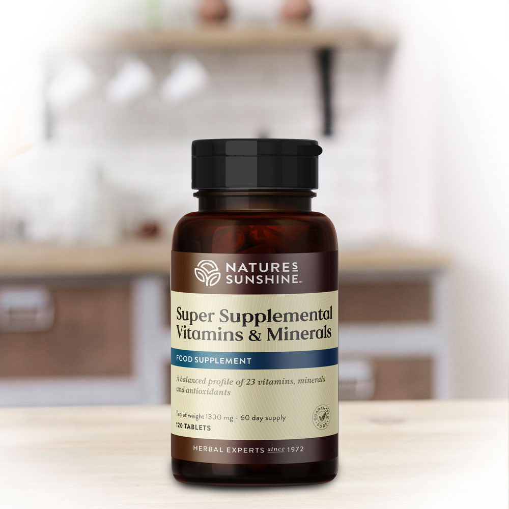 Bottle of Nature's Sunshine's Super Supplemental Vitamins and Minerals on a kitchen counter