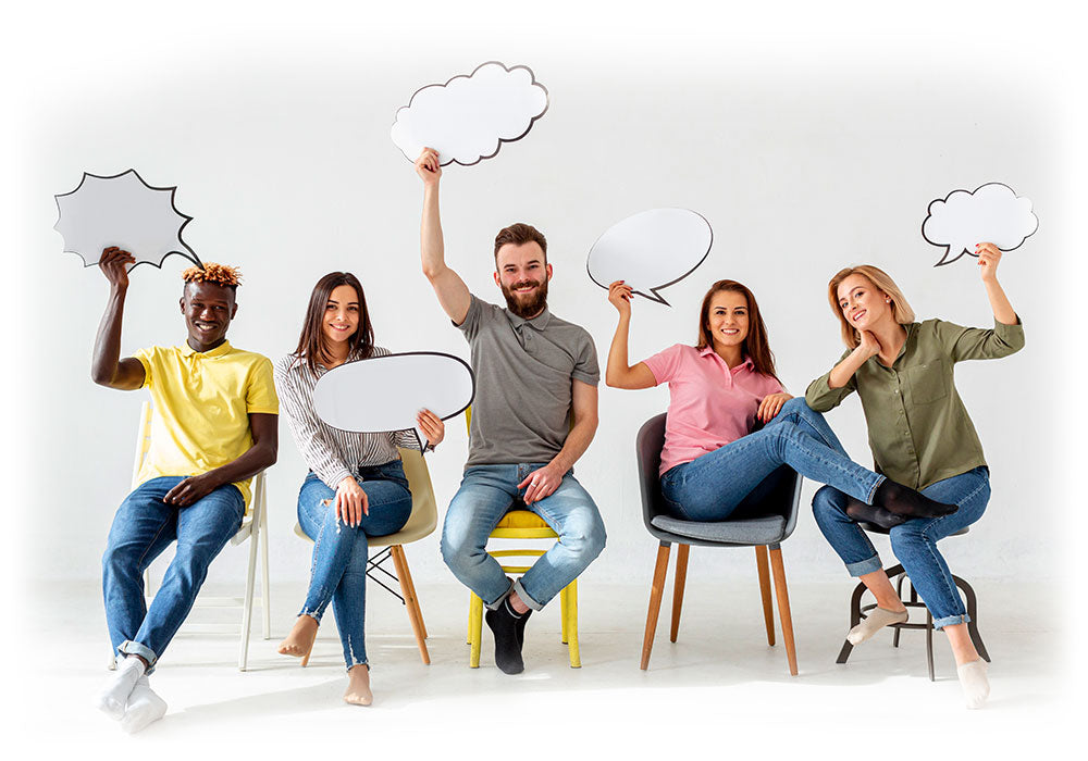 Diverse group holding blank speech bubbles, ready for healthy communication.